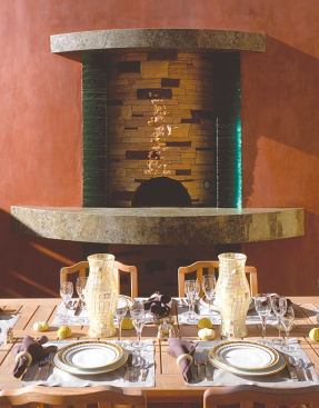 It's also the site of the decorative and functional stone and stacked-glass pizza oven, the garden's kitchen.