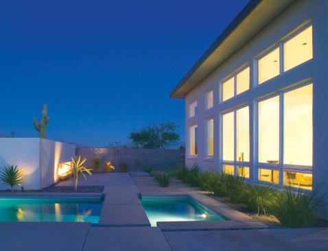 The landscape walls come in toward the house to produce an intimate terrace surrounding the master suite.