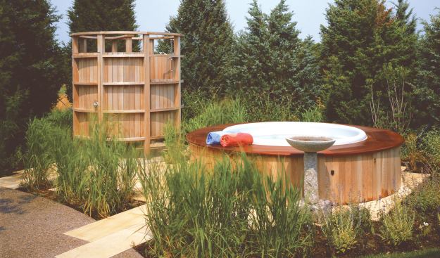 Set in the landscape, this combination spa/shower is a destination from the nearby master bath.