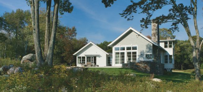 Handcrafted stone walls define the built portion of the property.