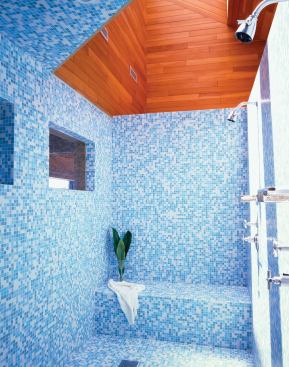 Materials that refer to sand and sea—and improved views of the beach itself—revive this 1970s Modernist bath.