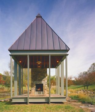 CHDA 2006 –Accessory Building / Grand Award Architect: Robert M. Gurney, FAIA, Architect, Alexandria, Va.; Builder: SugarOak, Herndon, Va. A diminutive 196 square feet in plan, this simple pavilion makes a big statement about the power of architecture to enhance an already special environment. The pavilion seems to float above the landscape, its light steel frame contrasting with a massive stone chimney that suggests the remnant of a long-lost building. A steep hip roof gives the tiny building a significant presence in the landscape.