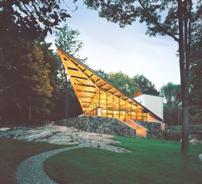 Steel beams anchor the playhouse's soaring roof.