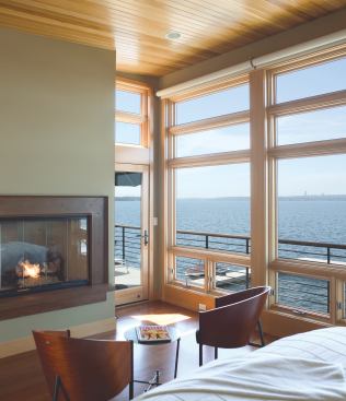 Polished fir ceilings provide a finishing touch in the master bedroom.