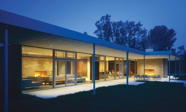 With a cruising-altitude view of Silicon Valley out the front door and a panoramic shot of the Santa Cruz Mountains out the back, the first task of this remodel was to get the architecture out of the way. Glass now comprises much of the building envelope.