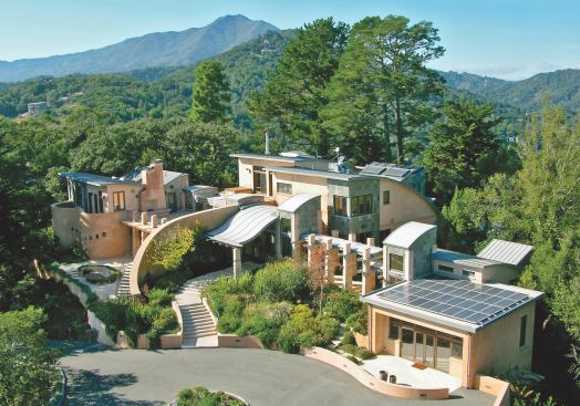 Combining sprayed earth exterior walls and rammed earth columns, this house represents Redhorse Constructors' current high-water mark in luxury green building. Sensors control natural ventilation by automatically opening and closing windows in a prescribed sequence. Photovoltaic arrays power geothermal heat pumps that feed in-slab hydronics for both heating and cooling.