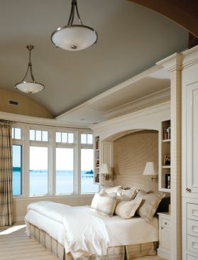 Simple painted wood lends a sense of calm to the master bedroom.
