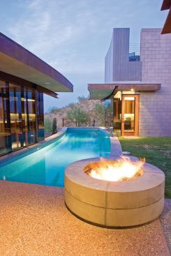 Miles of desert preserve are on view from a rooftop deck on the detached study.