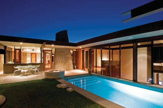 The swimming pool's icy-blue 1-inch tile was made from two layers of glass with a bubble between.
