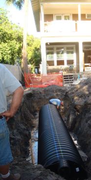 A 1,200-gallon underground cistern collects rainwater from the roof and air conditioning condensate for irrigation.
