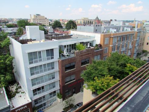 A rooftop provides an excellent vantage point to see the new condo buildings along Church Street, which runs perpendicular to 14th street. Most new buildings feature rooftop terraces with great views of low-slung Washington, D.C.