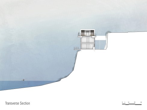 The Cliff House by Specht Architects sits on a narrow limestone ridge overlooking Lake Austin, halfway down a cliff.