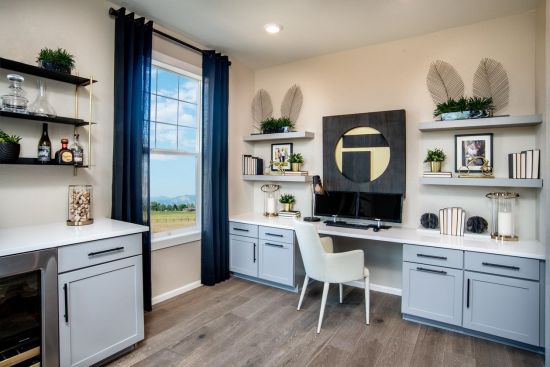 KB Home introduced its dedicated home office packages in summer 2020, which include built-in workstations, large open shelving, and an upgraded electrical package.