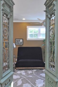 Egyptian doors add privacy to the study.