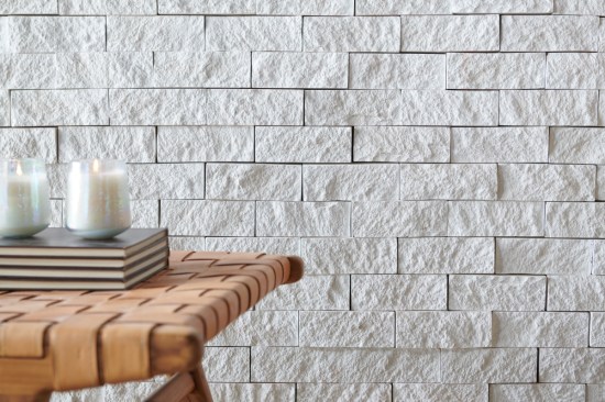 Cultured Stone’s Hewn Stone in Arctic brings the chic solemnity of castle-work to modern architecture with rough textures and smooth colors. Photo credit: Westlake Royal Building ProductsTM
