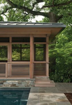 Perched at the edge of a wooded slope, the building creates a welcome sense of outdoor privacy in the city.


