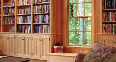 Lakeside Library is a multi-function accessory unit designed to complement a 100-year-old lakeside vacation house. The outbuilding—which serves as library, guest house, boat storage, garage, exercise room, and tennis viewing pavilion—is more vertically proportioned but incorporates the same exterior materials as the house.