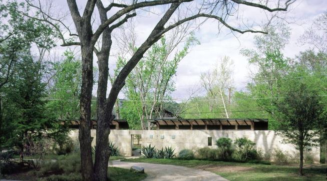 An unassuming entry wall leads to this Lake Austin Residence by Lake/Flato Architects, the 2004 Project of the Year. For more information on this project, 
click here.
