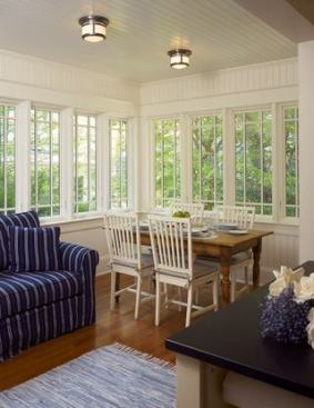 The small breakfast room repurposes a small porch and is the only part of the home that extends beyond the original footprint.