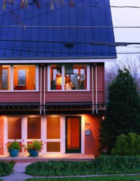 This 1968 tract house underwent a serious makeover, yet still complements the neighborhood and maintains a respectful scale. Architect: Reader Swartz&nbsp; Builder: David L. Goode