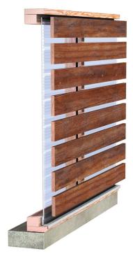 An innovative wall detail provides light, shelter, and security for a vineyard work building.