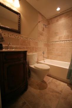 All the bathrooms have dual flow toilets. A recirculating pump is located in the master bathroom -- the furthest location from the hot water heater -- and recirculates water until it becomes hot. This way, minimal water is wasted while waiting for hot water.