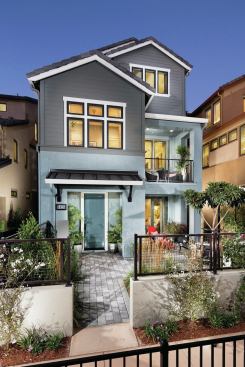 An arduous city architectural review board rendered home designs that are clean, but with traditional roots.
