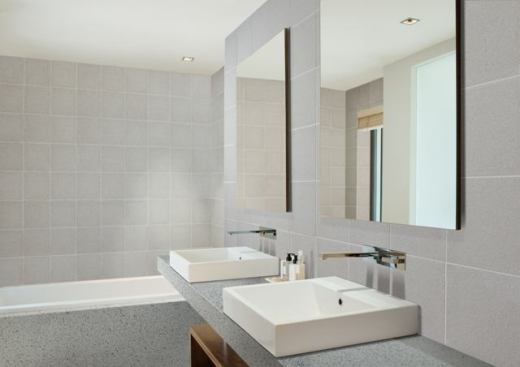 Terrazzo Atmosphere stone tile and slabs come in 16 contemporary colors including fine and large grain to meet varying aesthetic tastes. Products are delivered factory sealed. The line features five field tile sizes, including 24 inches by 24 inches, and slabs are available in standard format or cut to size. www.daltile.com.