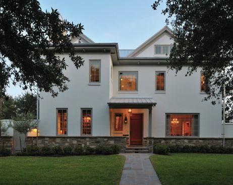 Shaker Lodge is a new house in an old neighborhood. The home is a blend of Shaker-style interior detail and a great room takes inspiration from the great lodges of America's National Parks. 