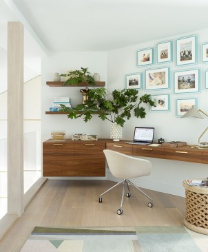 For designer Daun Curry’s East Hampton Residence, a lofted office with glass railing allows users to feel connected to the main living space below.