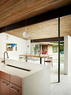 Looking across the island to the dining room and courtyard beyond.