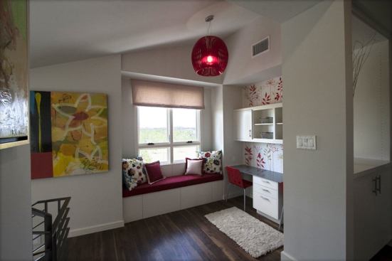A built-in study nook and window seat grace the upstairs landing.