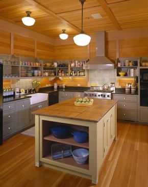 Open shelves give off a casual vibe in this vacation home and make it easy for guests to find what they need.