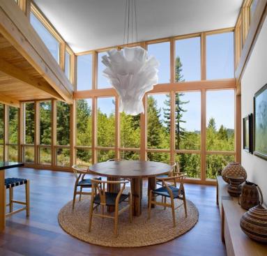 A glass rear wall permits valuable solar gain and daylighting. 