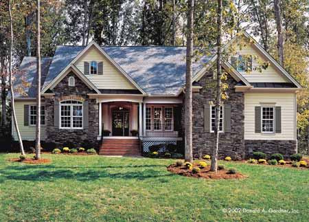 No. 2: Comfy Charm At only 2,097 square feet, this plan packs a punch. Outside, interspersed stone and wood siding give it a country flavor. Inside, cathedral ceilings give the public areas a spacious feel. For more images and information, click 
here.