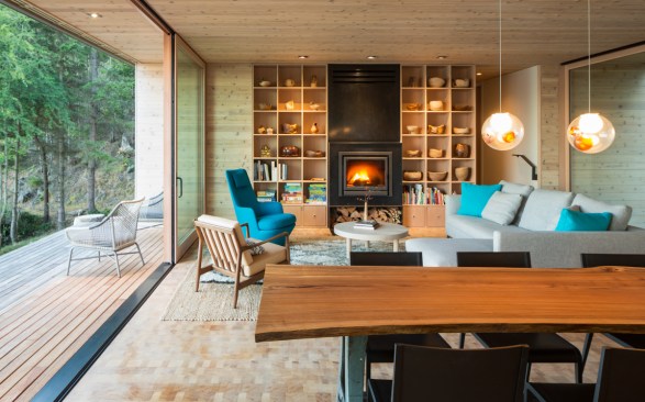 Large glass doors open Lone Madrone to nature on temperate days, allowing occupants to take advantage of its expansive decks.