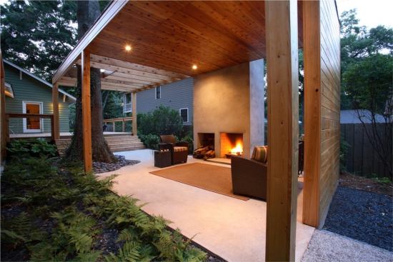 CHDA 2009 – Outdoor Spaces / Merit Award Architect: Lightroom LLC, Decatur, Ga.; Builder: Pinnacle Custom Builders, Decatur Local materials and references to Southern vernacular building types inform the sculptural modernism of this cost-efficient backyard complex. The living pavilion's freestanding fireplace makes reference to the chimneys of burned-out country houses that dot the Georgia countryside. Nature intervenes in the form of a stately water oak that anchors a corner of the living area, rising through a roof that dissolves into an open trellis.