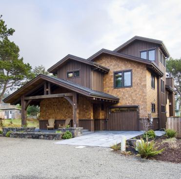 The three-story home is configured in a sawtooth plan to maximize views to the outdoors, daylighting, and natural ventilation. The stacking of floor levels preserved as much outdoor space as possible on the narrow 50-by-100-foot lot.