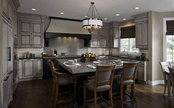 Cabinetry in the kitchen and bathrooms features low-VOC finishes, has no added urea formaldehyde, and was manufactured locally. The induction cooktop was chosen as an alternative to gas.