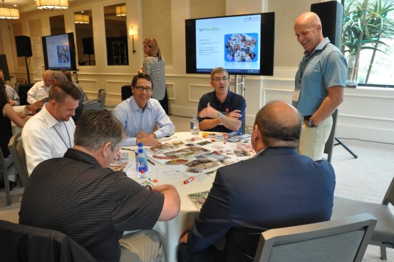Mollie Carmichael of John Burns Real Estate Consulting broke the group into teams to compile visual collages that reflected what a home means to them.