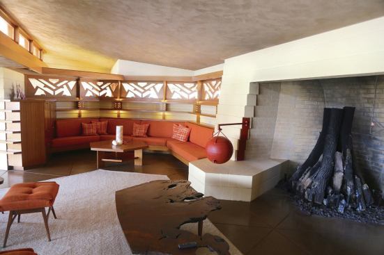 The architects used almond shells to remove paint from the fireplace interior, restoring it to its original natural look, and added a caldron that had never been built.