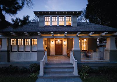 The front elevation contained clues to the home's original bungalow form. Yet the swooping roof, so characteristic of the period, was terminated at the front by a first-floor enclosure that had almost no penetrations and zero welcome.
