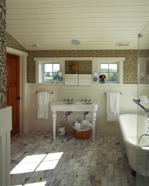 The master bath has a mix ofvintage and modern touches that meld well. 