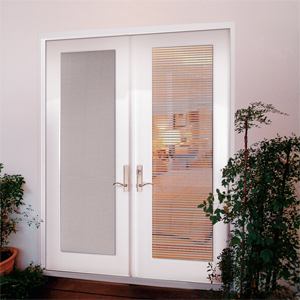 This new line of fiberglass entry doors has built-in mini-blinds to create privacy and sun shade. Sealed between tempered glass, the mini-blinds can be tilted or they may be raised completely up or down. A flush-glazed design means door panels and window frames will fi t into a modern clean look. Doors come in paintable smooth skin or an oak grain finish. Plastpro. 800-779-0561. www.plastproinc.com.