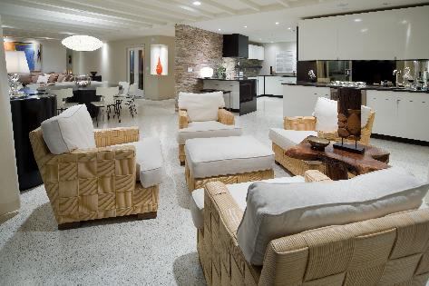 Phil Kean Designs opened the home's interior so the living areas could flow one into another. Ceiling detail creates texture and depth.