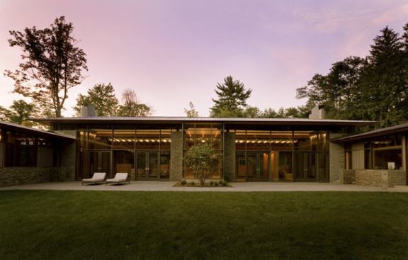 The rear courtyard exhibits the symmetry and order that characterize West Coast architect Jim Cutler's take on East Coast formality.