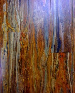 Woven Poplar flooring is made from 100% kiln-dried recycled wood from furniture scraps and hardening resin. The Forest Stewardship Council-certified product contains no urea-formaldehyde and is tongue and grooved on all four sides. Planks measure 9/16 inches thick, 3 7/8 inches wide, and 72 7/8 inches long. It can be nailed down, glued down, and installed over radiant heat systems. 
www.ecotimber.com.
