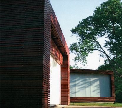 A translucent plastic wall along the home's south side brings valuable light inside without compromising the owners' privacy.
