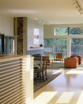 To make best use of space, kitchen cabinets are pulled away from the wall to create a useful nook.