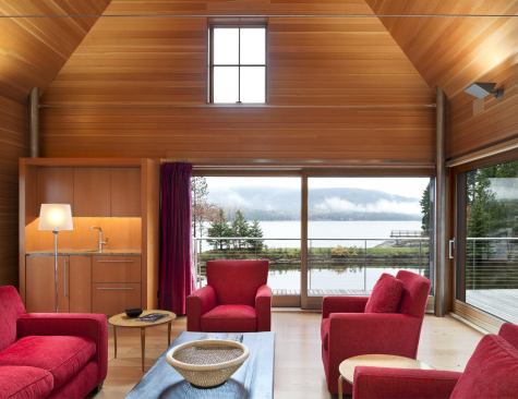 Inside, the exterior’s subtly abstracted vernacular gives way to a modern composition that mixes natural, local materials with select bits of stainless steel. 